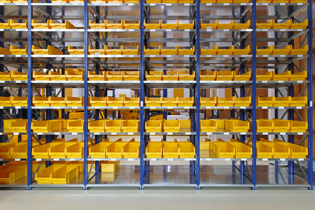 Storage trays and bins in distribution warehouse